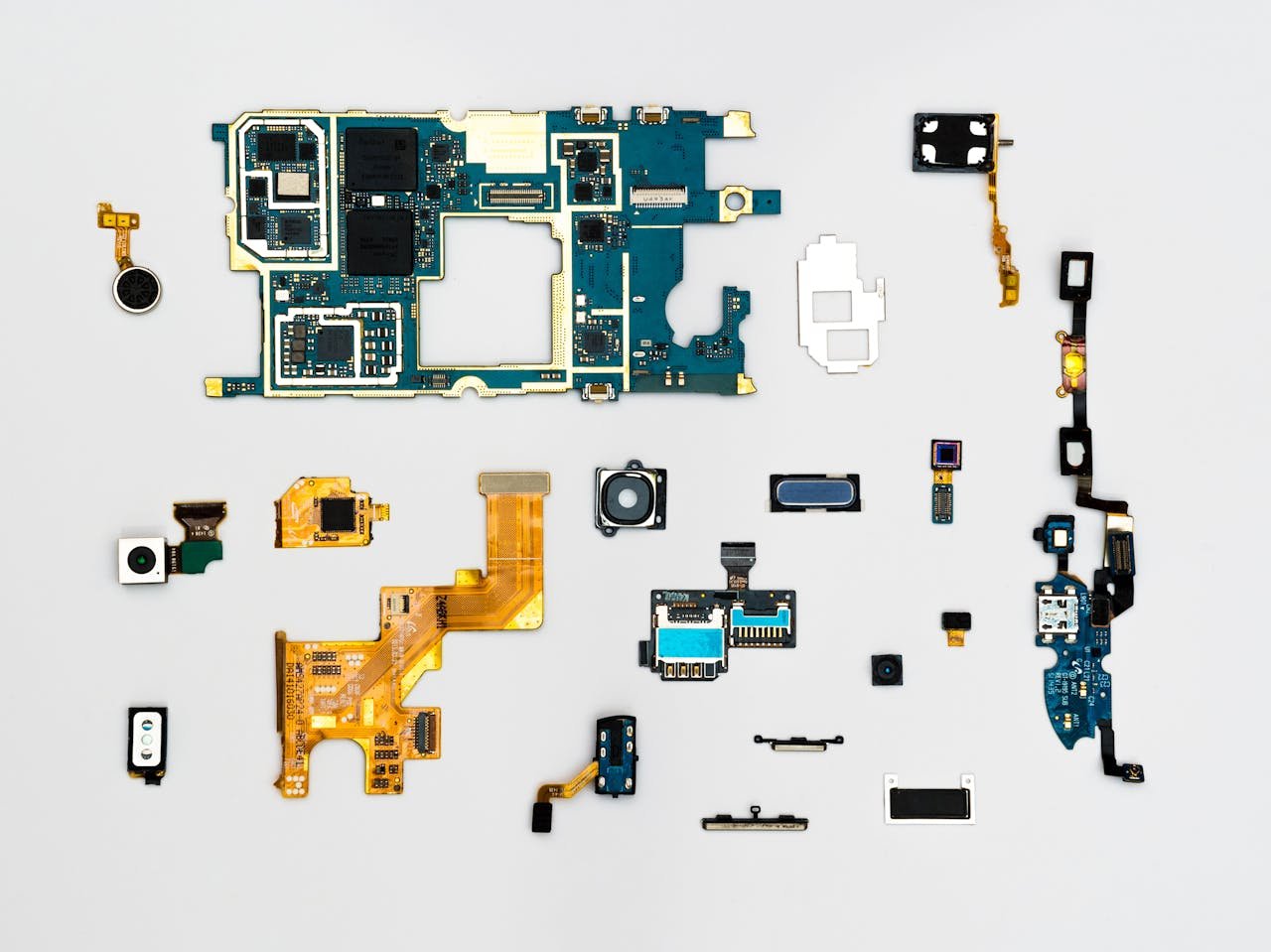 about-03 Exploded view of smartphone components showcasing intricate technological design.