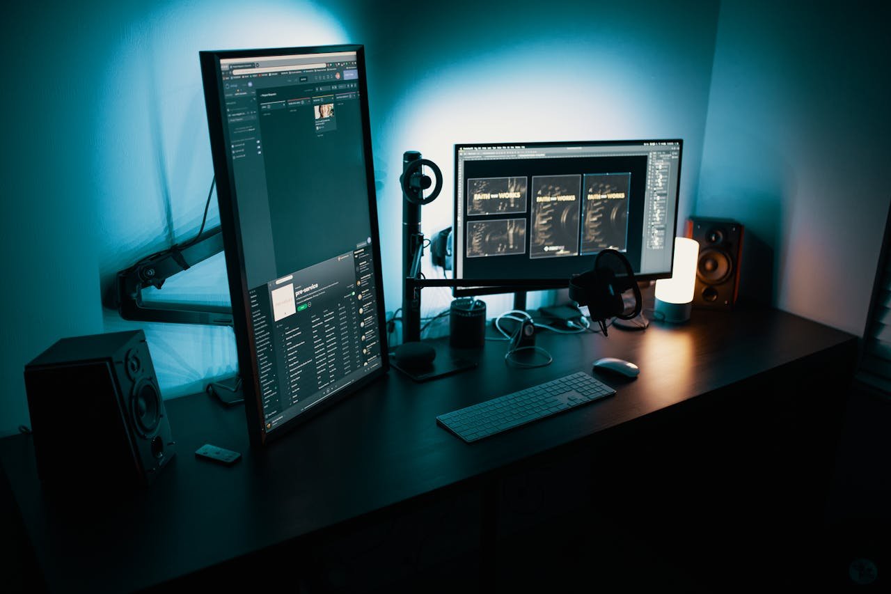 why-choose-us-02 A contemporary office desk featuring a dual monitor setup with stylish lighting, ideal for tech enthusiasts.